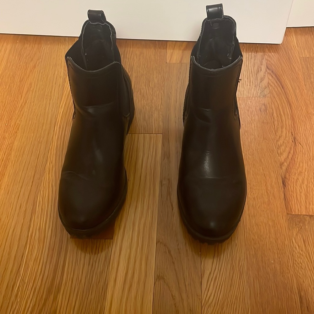Black boots, they hit around the ankle